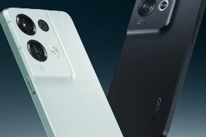Two smartphones, one light green and one black, with triple camera setups on the back.